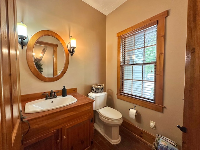 4909 Barnstable Ln, Lansing, MI 48906 - half bath with vanity and wood finished floors