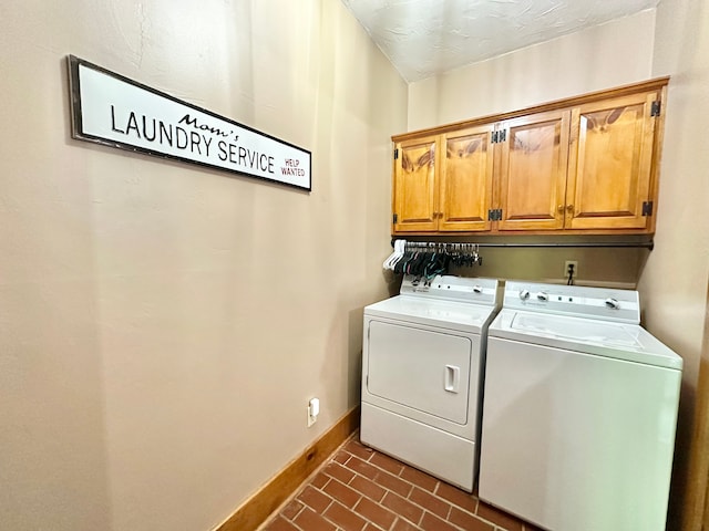 4909 Barnstable Ln, Lansing, MI 48906 - laundry room with cabinet space, separate washer and dryer, and brick patterned flooring