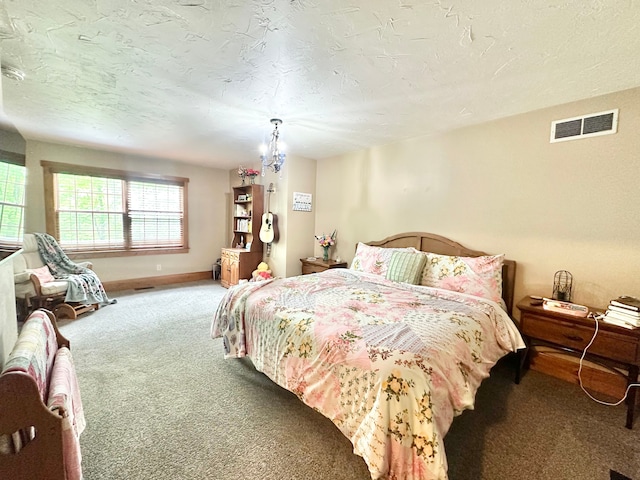 4909 Barnstable Ln, Lansing, MI 48906 - bedroom with carpet flooring and a textured ceiling