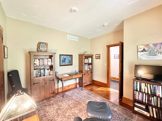 4909 Barnstable Ln, Lansing, MI 48906 - office area with wood finished floors and baseboards