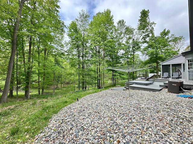 4909 Barnstable Ln, Lansing, MI 48906 - view of yard with a deck