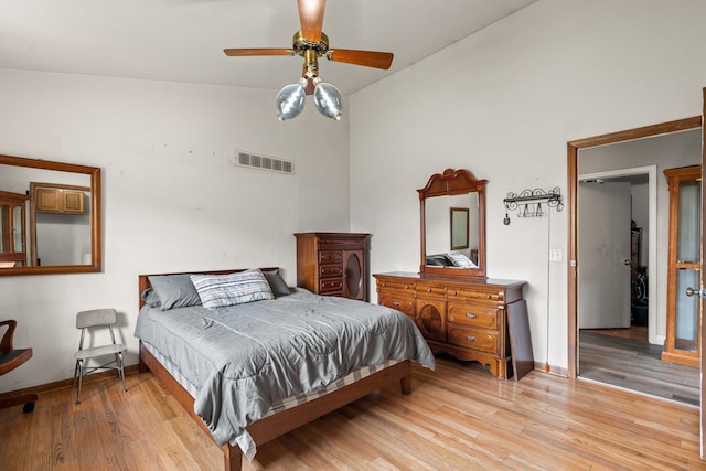 47697 Barclay Ct, Shelby Twp, MI 48317 - bedroom featuring light wood-style flooring, baseboards, high vaulted ceiling, and a ceiling fan