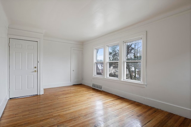 8916 Mendota St, Detroit, MI 48204 - unfurnished room with light wood-type flooring and baseboards