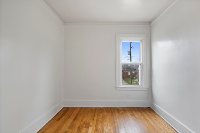 8916 Mendota St, Detroit, MI 48204 - empty room with crown molding, light wood-type flooring, and baseboards
