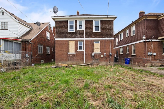 8916 Mendota St, Detroit, MI 48204 - rear view of house with fence and brick siding