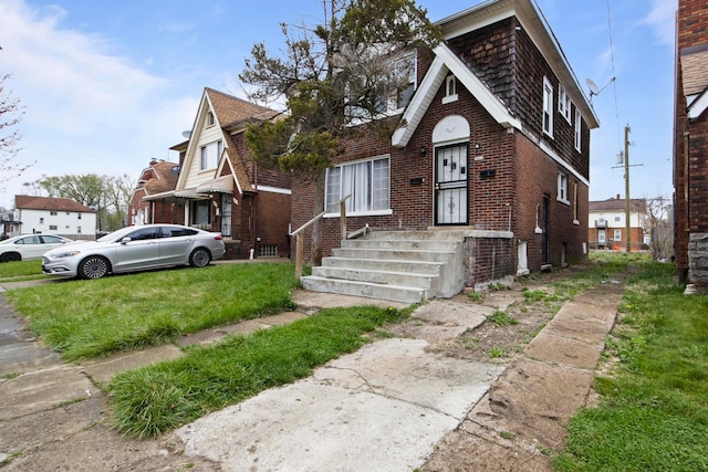 8916 Mendota St, Detroit, MI 48204 - tudor house featuring brick siding