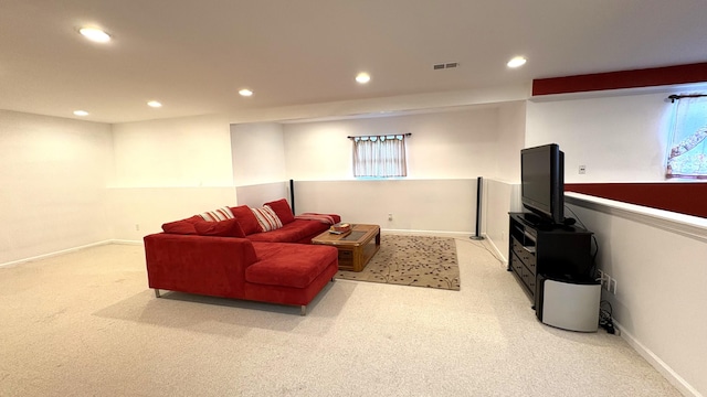 1300 Waterways Dr, Ann Arbor, MI 48108 - living room with light colored carpet, recessed lighting, baseboards, and healthy amount of natural light