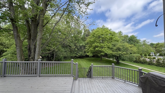1300 Waterways Dr, Ann Arbor, MI 48108 - deck with area for grilling and a yard
