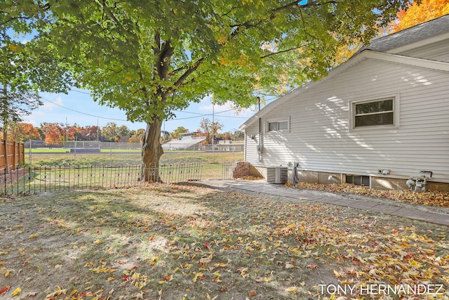 836 Phoenix St, South Haven, MI 49090 - view of property exterior featuring a fenced backyard and central AC unit