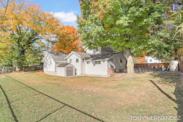 836 Phoenix St, South Haven, MI 49090 - back of house with a storage unit and an outdoor structure