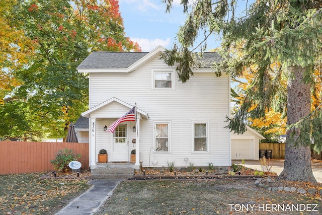 836 Phoenix St, South Haven, MI 49090 - traditional-style house with fence and roof with shingles