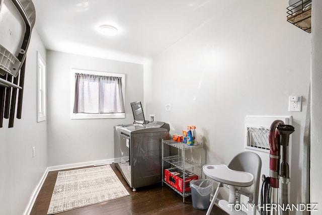 836 Phoenix St, South Haven, MI 49090 - washroom with washing machine and clothes dryer, dark wood-style flooring, and baseboards