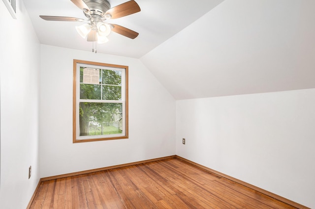 214 S Monroe St, Sturgis, MI 49091 - additional living space featuring light wood-style floors, lofted ceiling, a ceiling fan, and baseboards