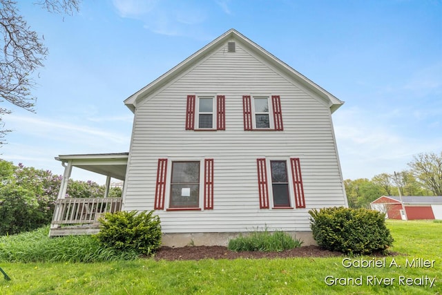 49 E 112th St, Grant, MI 49327 - back of property with a yard