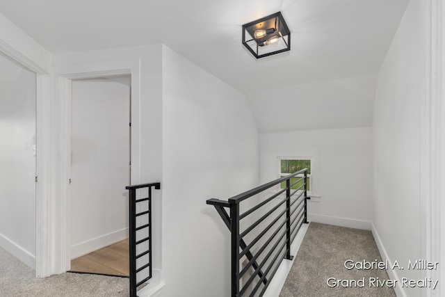 49 E 112th St, Grant, MI 49327 - staircase featuring carpet floors and baseboards