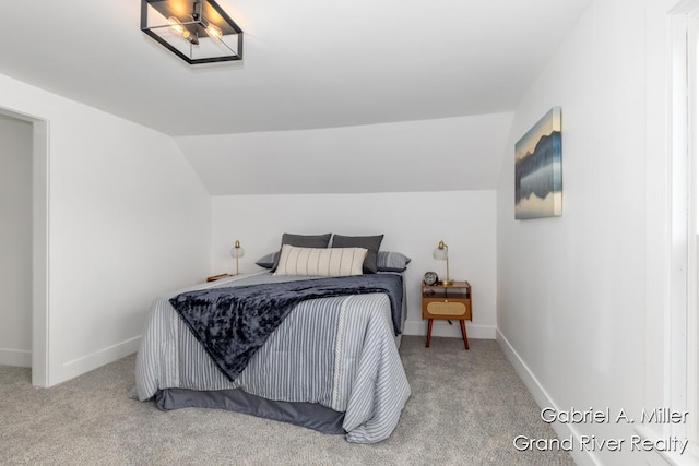 49 E 112th St, Grant, MI 49327 - bedroom with carpet flooring, lofted ceiling, and baseboards