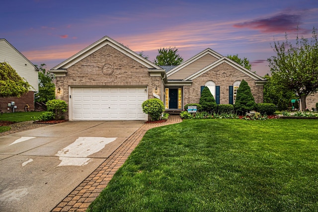 47291 Fairlawn Ct, Canton, MI 48188 - single story home featuring driveway, brick siding, a front lawn, and an attached garage