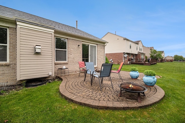 47291 Fairlawn Ct, Canton, MI 48188 - view of patio with an outdoor fire pit