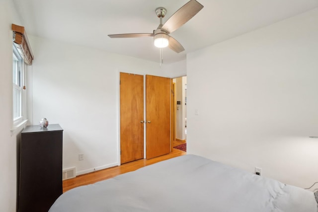 1815 Cooley Ave, Ann Arbor, MI 48103 - bedroom featuring wood finished floors, baseboards, and ceiling fan