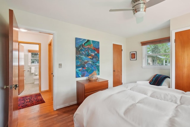 1815 Cooley Ave, Ann Arbor, MI 48103 - bedroom with wood finished floors, baseboards, and a ceiling fan