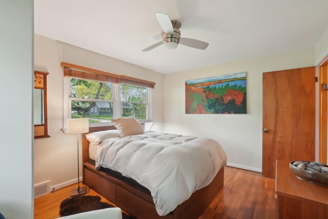 1815 Cooley Ave, Ann Arbor, MI 48103 - bedroom with light wood-type flooring, baseboards, and a ceiling fan