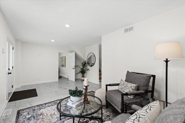 49712 Geddes Rd, Canton, MI 48188 - living room featuring marble look tile flooring, recessed lighting, and baseboards