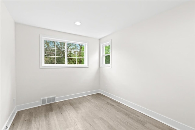 49712 Geddes Rd, Canton, MI 48188 - empty room featuring light wood finished floors, baseboards, and recessed lighting