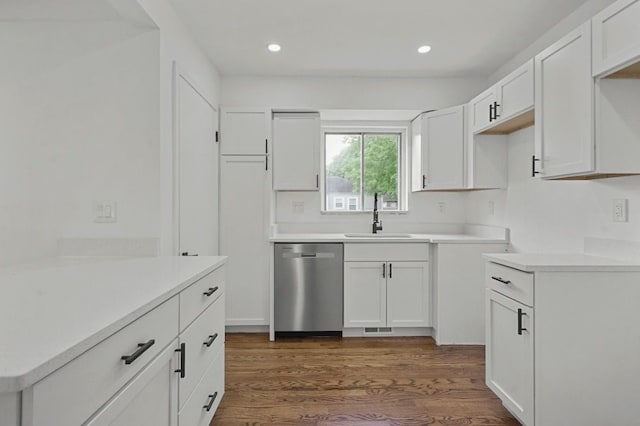620 2nd Ave, Pontiac, MI 48340 - kitchen with dishwasher, a sink, dark wood-style flooring, white cabinets, and recessed lighting