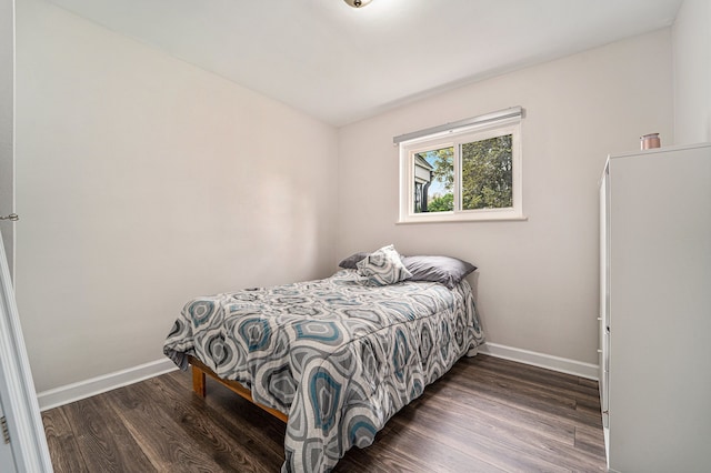 33731 Newport Dr, Sterling Heights, MI 48310 - bedroom featuring baseboards and wood finished floors