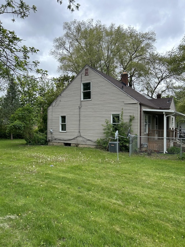 view of side of property with a chimney