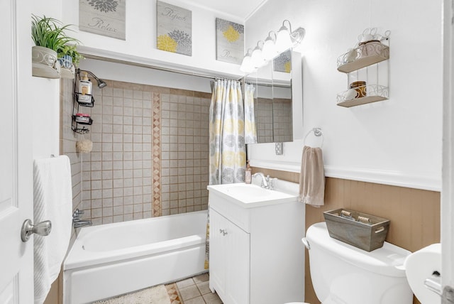full bathroom featuring toilet, shower / tub combo with curtain, vanity, and tile patterned flooring