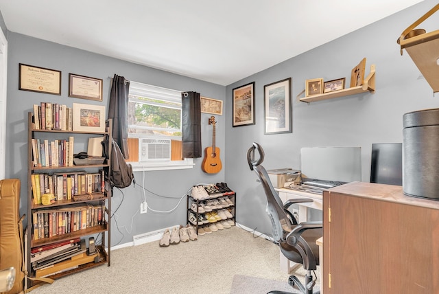 carpeted office space featuring cooling unit and baseboards