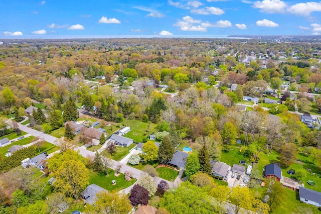 aerial overview of property's location with nearby suburban area