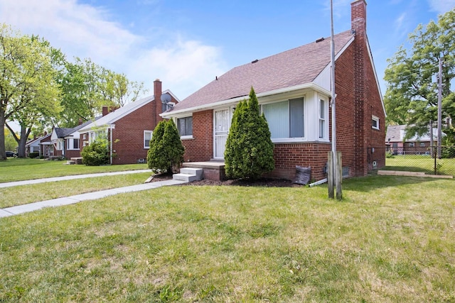 8105 Bramell, Redford, MI 48239 - bungalow-style home with brick siding, a chimney, roof with shingles, and central AC