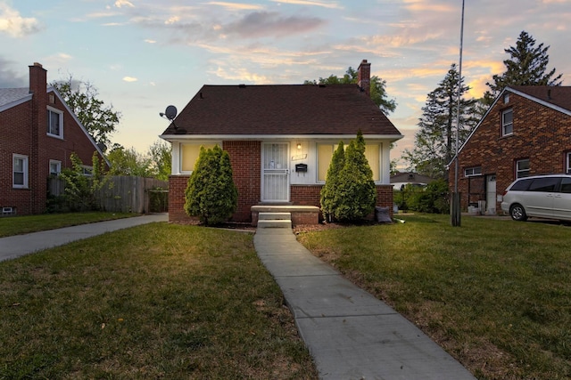 8105 Bramell, Redford, MI 48239 - bungalow-style house with brick siding and a chimney