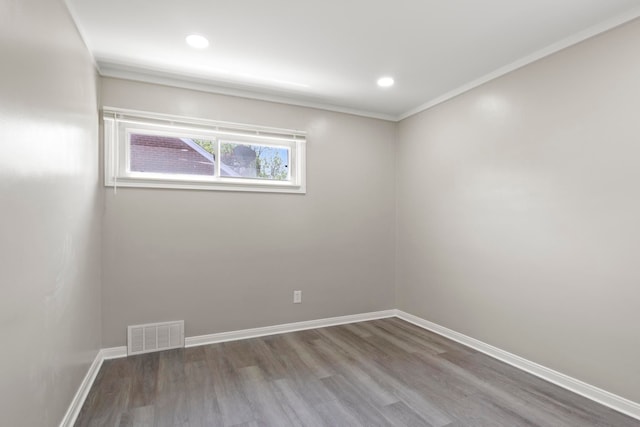 8105 Bramell, Redford, MI 48239 - spare room with wood finished floors, ornamental molding, baseboards, and recessed lighting