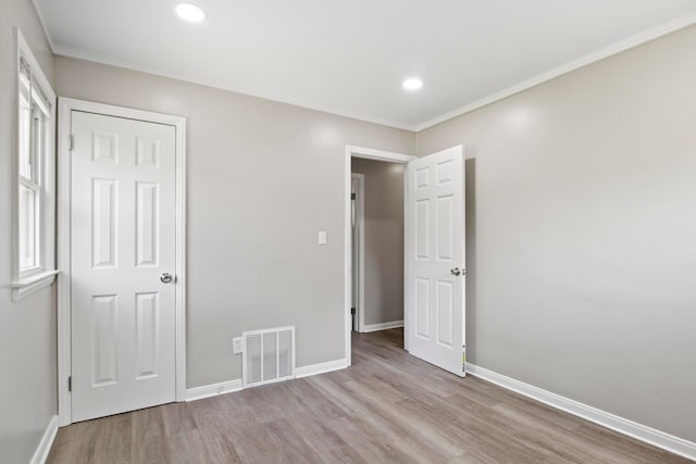 8105 Bramell, Redford, MI 48239 - unfurnished bedroom featuring wood finished floors, baseboards, and recessed lighting