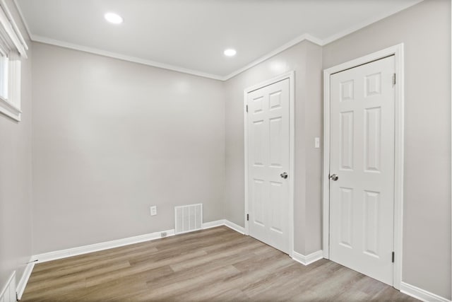 8105 Bramell, Redford, MI 48239 - basement featuring wood finished floors, crown molding, baseboards, and recessed lighting