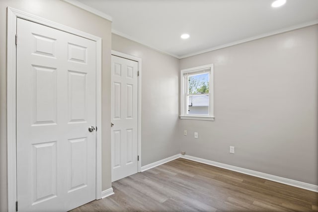 8105 Bramell, Redford, MI 48239 - unfurnished bedroom featuring wood finished floors, baseboards, ornamental molding, and recessed lighting