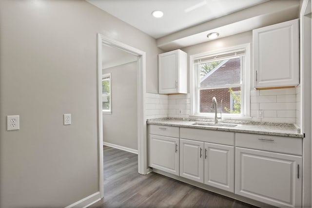 8105 Bramell, Redford, MI 48239 - kitchen with a sink, white cabinetry, baseboards, dark wood finished floors, and tasteful backsplash