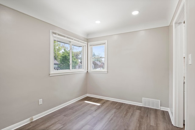 8105 Bramell, Redford, MI 48239 - unfurnished room with wood finished floors, baseboards, and recessed lighting