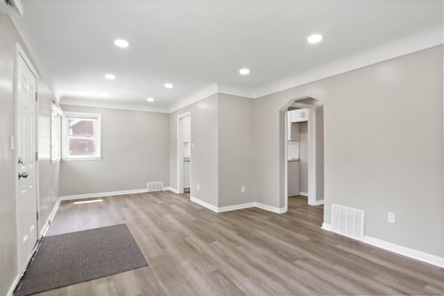 8105 Bramell, Redford, MI 48239 - interior space with arched walkways, wood finished floors, baseboards, and recessed lighting