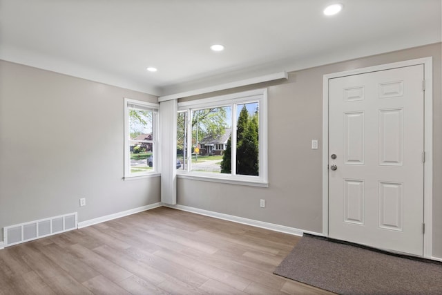 8105 Bramell, Redford, MI 48239 - foyer with healthy amount of natural light, wood finished floors, baseboards, and recessed lighting