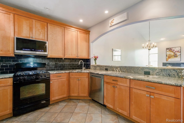 235 Cherry Stone Dr Unit 16, Canton, MI 48188 - kitchen with appliances with stainless steel finishes, a sink, a chandelier, backsplash, and light tile patterned floors