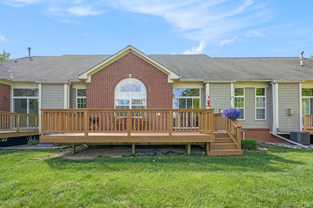 235 Cherry Stone Dr Unit 16, Canton, MI 48188 - rear view of property featuring central AC unit, a wooden deck, roof with shingles, and a lawn