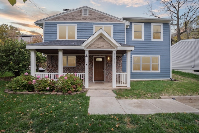 1812 Orchard St, Ann Arbor, MI 48103 - view of front of property featuring covered porch and a front lawn