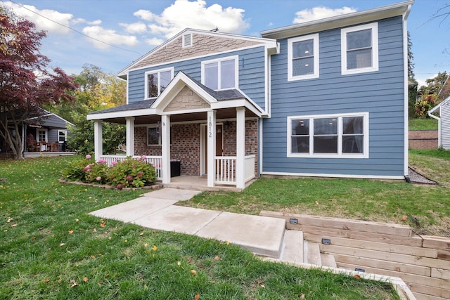 1812 Orchard St, Ann Arbor, MI 48103 - view of front of home featuring covered porch and a front lawn