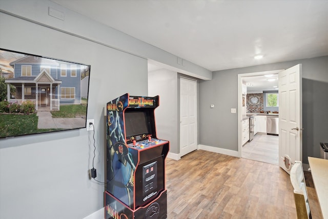 1812 Orchard St, Ann Arbor, MI 48103 - game room with light wood-style floors and baseboards
