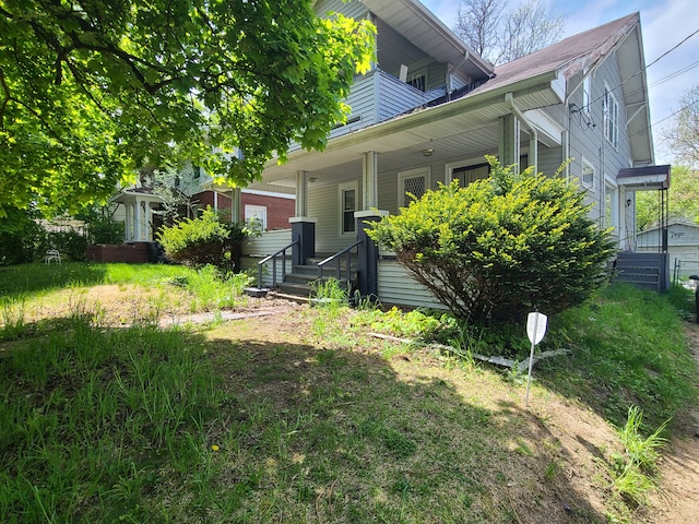 1814 Jasmine Ave, Flint, MI 48503 - rear view of property with covered porch