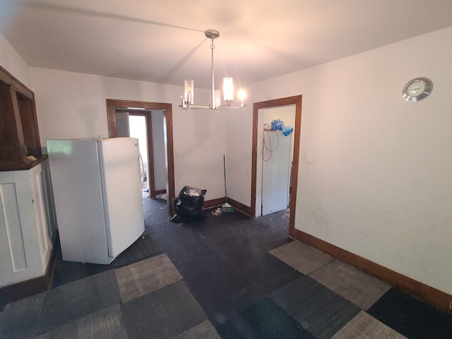 1814 Jasmine Ave, Flint, MI 48503 - dining area with a chandelier and baseboards